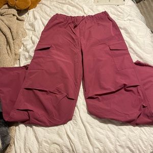 Dark pink parachute pants
